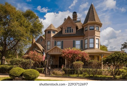 A southern mansion and a large live oak tree in Fernandina, Georgia. - Powered by Shutterstock