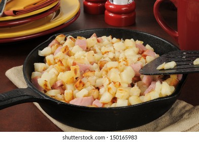 Southern Style Hash Browns With Ham In A Cast Iron Skillet