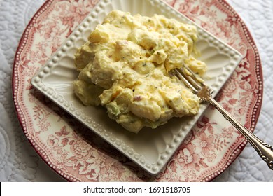 Southern Style Potato Salad On Antique Plates. 