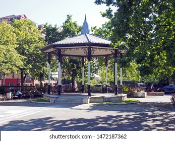 southport, merseyside, united kingdom - 28 june 2019: people sat around the historic bandstand in the park area of lord street in southport