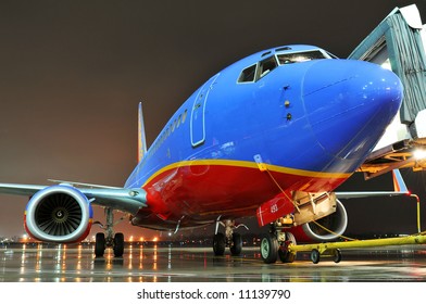 Southwest Airlines Airplane At The Departing Gate At Night