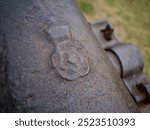 Southwold, Suffolk, UK - August 21st 2024 - view of a Tudor Rose on one of the historic Southwold canons