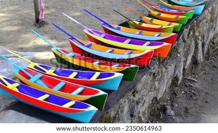 Souvenir of colorful wooden boats