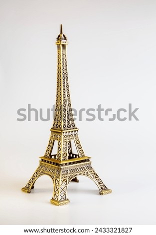Souvenir Eiffel Tower on a white background.
