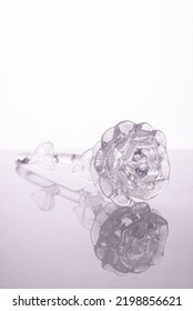 Souvenir Glass Crystal Rose On A White Background.