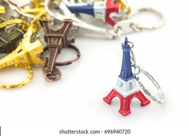 Souvenir Key Chain Of Mini Eiffel Tower (Tour Eiffel) On White Background.