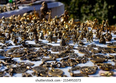 Souvenir Stall. Street Shop With Metal Figures.