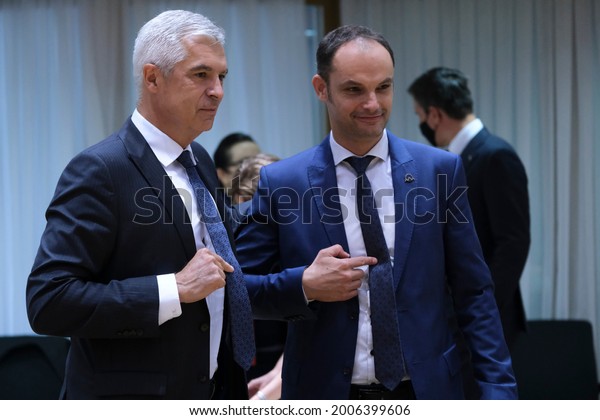 Sovakia\'s Foreign Minister Ivan Korcok speaks with\
Slovenia\'s Foreign Minister Anze Logar  during a meeting of EU\
foreign ministers, at the European Council in Brussels, Belgium on\
July 12, 2021.