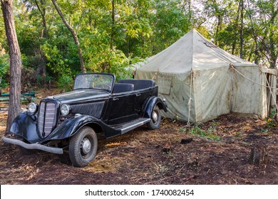 A Soviet Black Car GAZ M1 Emka With A Phaeton Body Standing In A Military World War II Tent Camp In A Forest. Nedvigovka, Rostov-on-Don Region / Russia - 30 August 2013.