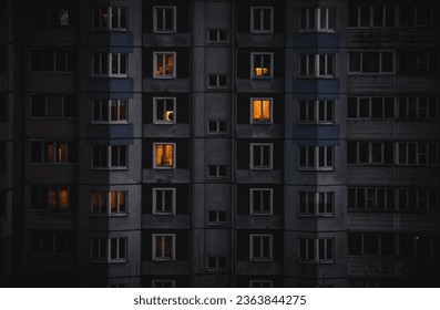 A soviet building in the city in evening in winter