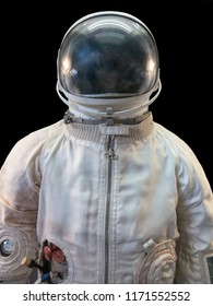 Soviet cosmonaut or astronaut or spaceman suit and helmet on black background, close up