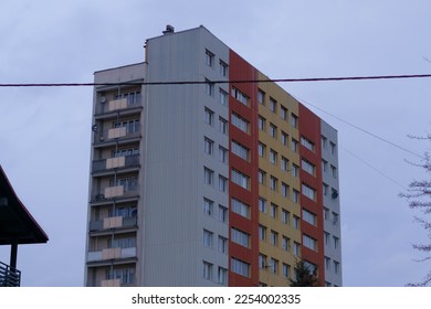 A Soviet multi-storey building sheathed with siding in Poland.  - Shutterstock ID 2254002335
