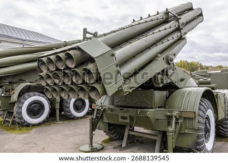 Soviet and Russian multiple rocket launchers. Field jet complex. A combat vehicle mounted on a truck chassis. Weapons with increased firepower. Heavy vehicle with multiple rocket launcher system.