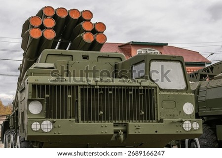 Soviet and Russian multiple rocket launchers. Field jet complex. A combat vehicle mounted on a truck chassis. Weapons with increased firepower. Heavy vehicle with multiple rocket launcher system.