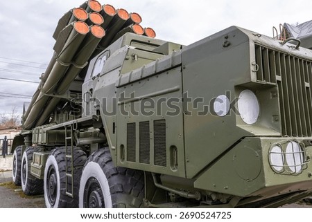 Soviet and Russian multiple rocket launchers. Field jet complex. A combat vehicle mounted on a truck chassis. Weapons with increased firepower. Heavy vehicle with multiple rocket launcher system.