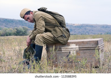 soviet soldier sits in the polygon