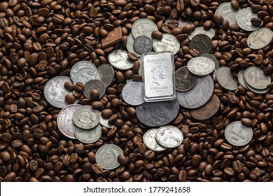 Soviet Union Coins Fall On Coffee Beans. Two Dollars In Silver. Charms And Bark Of The Mamvri Oak. Washingtonia Leaflet. Flatley. Souvenirs On A Dark Background. Brown Background