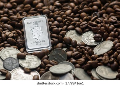 Soviet Union Coins Fall On Coffee Beans. Two Dollars In Silver. Charms And Bark Of The Mamvri Oak. Washingtonia Leaflet. Flatley. Souvenirs On A Dark Background. Brown Background