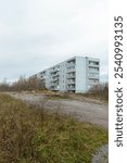 Soviet-era panel apartment building in Krasnofarforny, Leningrad region, Russia, showcasing typical architecture of the period.