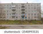 Soviet-era small-panel apartment building in Krasnofarforny, Leningrad region, Russia, reflecting typical mid-20th century architecture.