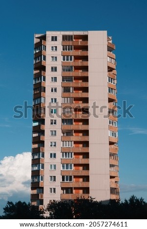 Soviet-style apartment building with balconies.