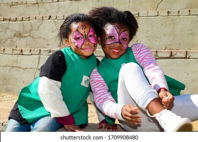 Soweto, South Africa - July 18, 2012: Young African Preschool Girls With Face Paint On The Playground 