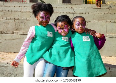 Soweto, South Africa - July 18, 2012: Young African Preschool Girls With Face Paint On The Playground 