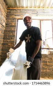 Soweto, South Africa - September 05, 2009: Community Outreach Program Helping To Build A Small Affordable House In Local Township