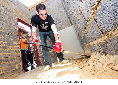 Soweto, South Africa - September 05, 2009: Community Outreach Program Helping To Build A Small Affordable House In Local Township