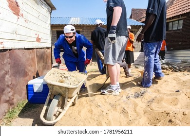 Soweto, South Africa - September 05, 2009: Community Outreach Program Helping To Build A Small Affordable House In Local Township