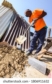 Soweto, South Africa - September 05, 2009: Community Outreach Program Helping To Build A Small Affordable House In Local Township