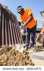 Soweto, South Africa - September 05, 2009: Community Outreach Program Helping To Build A Small Affordable House In Local Township