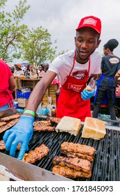 Soweto, South Africa - September 17, 2017: Diverse African Vendors Cooking And Serving Various Bread Based Street Food At Outdoor Festival