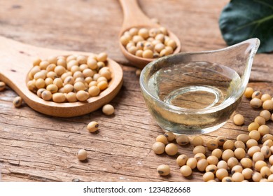 Soy Bean And Soy Oil On Wooden Table