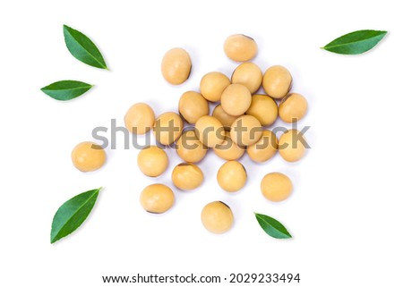 Soy beans with green leaves isolated on white background, top view, flat lay.