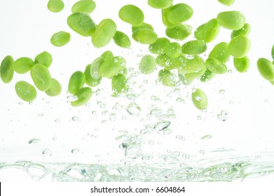 soy beans jumping out of the water