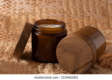 Soy Candles In A Brown Glass Jar With A Wooden Lid. Aromatherapy. Candle On A Beige Background Closeup. Place For A Label. Wax And Wick. Home Decor. Handmade. Air Freshener. Soy Candle Concept