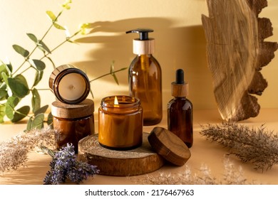 Soy candles in a glass jar. Aromatherapy. Burning candle and lavender. Wooden lid for jars. Beige background. Comfort and relaxation. Handmade. Home decor. - Shutterstock ID 2176467963
