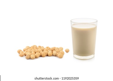 Soy milk with soy beans isolated on white background.