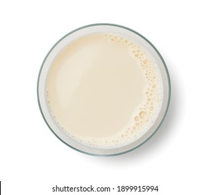 Soy Milk In A Glass On A White Background. View From Above