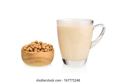 Soy milk with soybeans isolated on white background.
