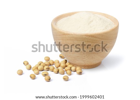 Soy protein powder (soy flour or soya flour) in wooden bowl and soybeans isolated on white background,