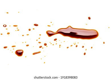 Soy Sauce Drip Isolated On A White Background. Soya Sauce Swirl Cut Out. Above View. Studio Shot.