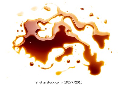 soy sauce drip isolated on a white background. soya sauce swirl cut out. above view. studio shot.