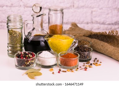 
Soy sauce, mustard orange sauce and different spices on a white background. - Shutterstock ID 1646471149