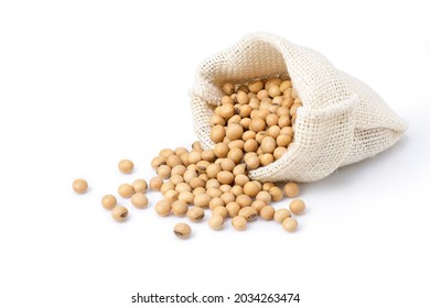Soybeans in sack bag isolated on white background. - Shutterstock ID 2034263474