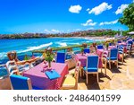 Sozopol, Burgas Province, Bulgaria: Empty tables on a terrace overlooking the sea. Cafe with sea view. Beautifull seascape at black sea. Summer destination