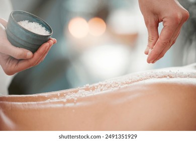 Spa, back and hands with salt for massage with body scrub, exfoliating and cosmetic treatment. Skincare, wellness therapist and client for natural detox, glowing skin and dermatology in beauty salon - Powered by Shutterstock