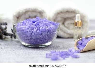 Spa composition. Bowl with lavender sea salt, selective focus