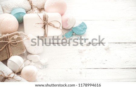 Spa composition of various objects for body care on a light wooden background, the concept of beauty and health